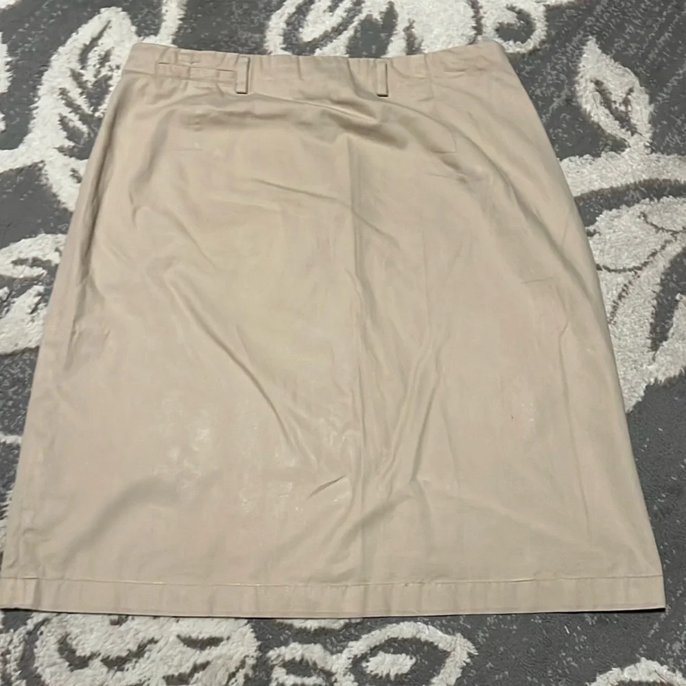 Ralph Lauren sport khaki skirt. Zips on side. Pre owned. Great condition. Size 8